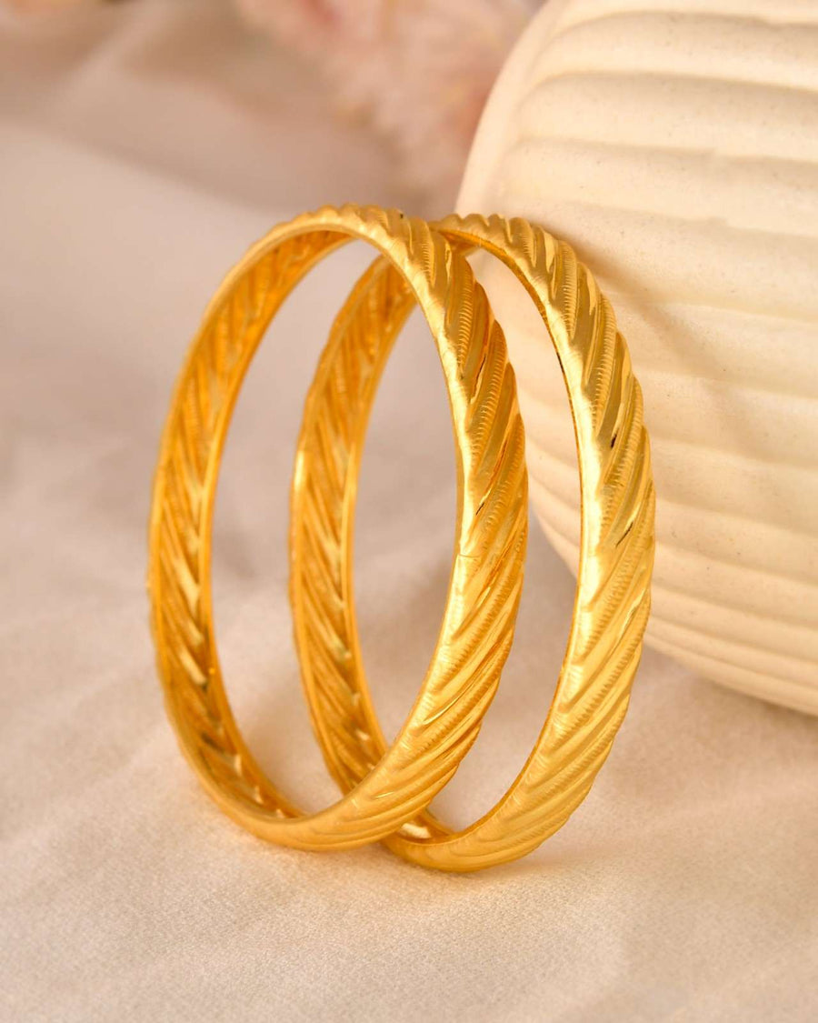 Sleek Dual-Finish Gold-Tone Bangles with Small Floral/Butterfly Embellishments