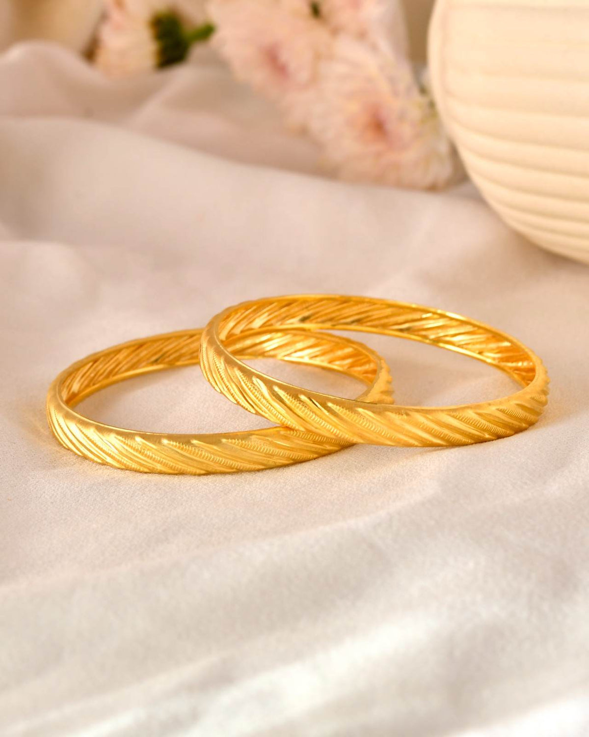Sleek Dual-Finish Gold-Tone Bangles with Small Floral/Butterfly Embellishments